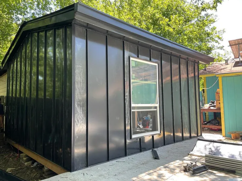 Black standing seam metal wall panels for Roof Inspection in Goshen